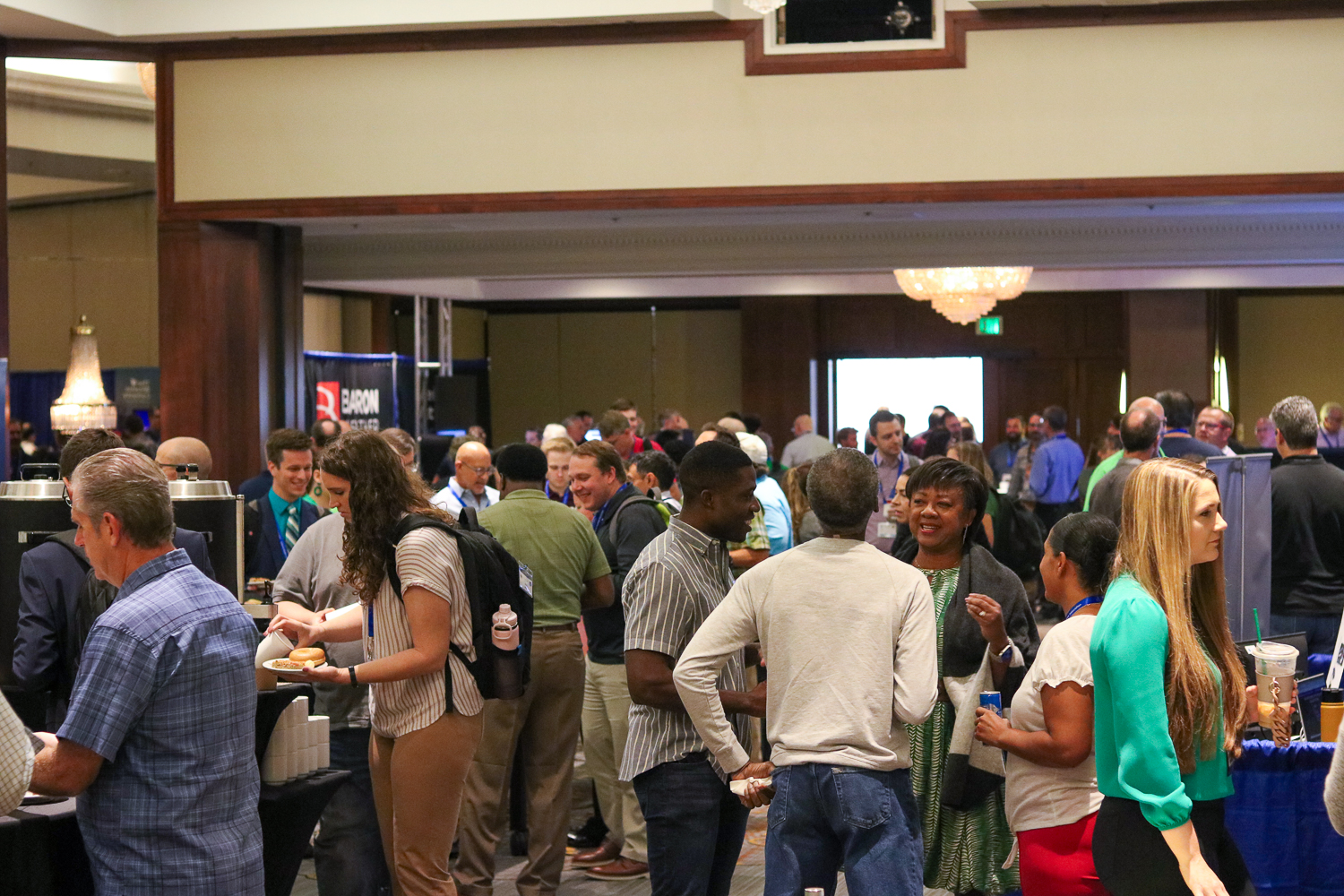 Attendees gather in the exhibit hall